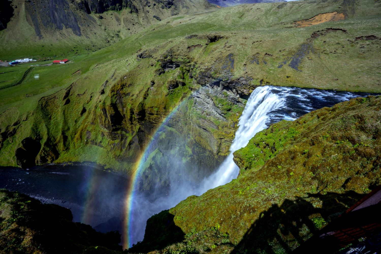 Waterfall with a double rainbow