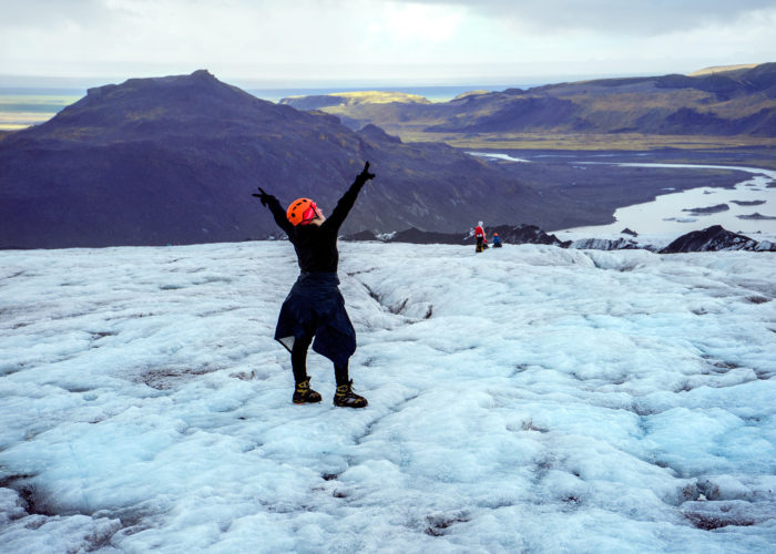 People enjoying being on a glacier