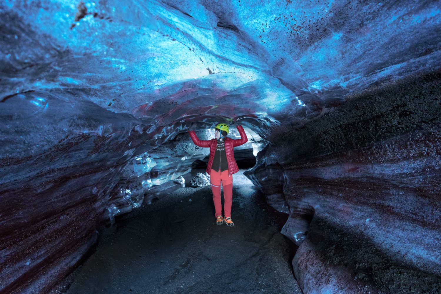 Woman inside ice cave