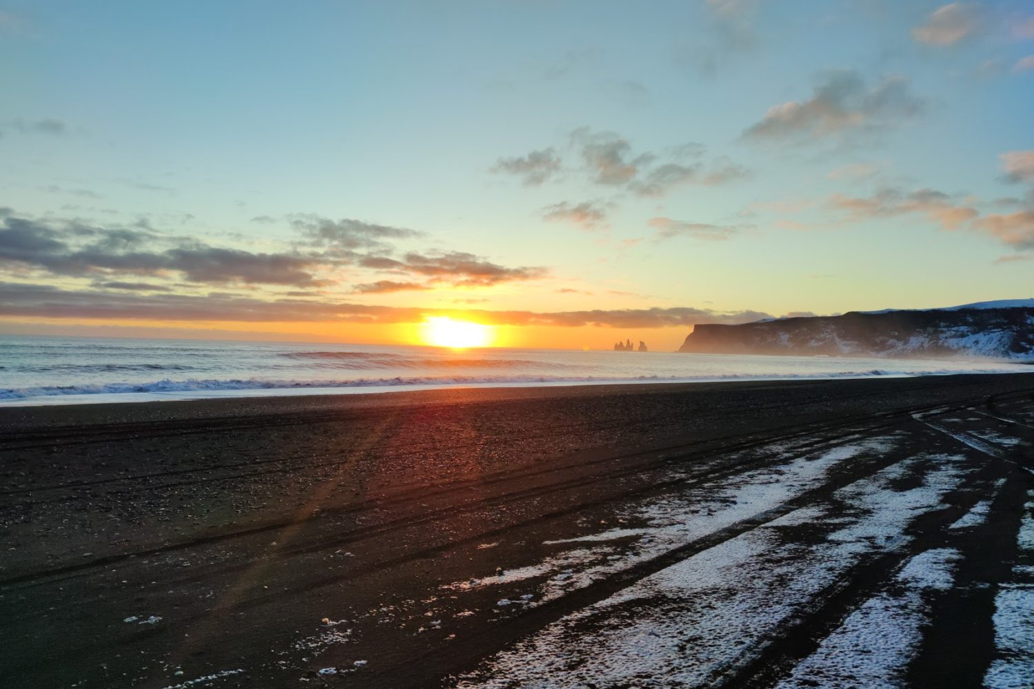 Black sand beach with a view over to Reynisdrangar close to Vík, South Iceland