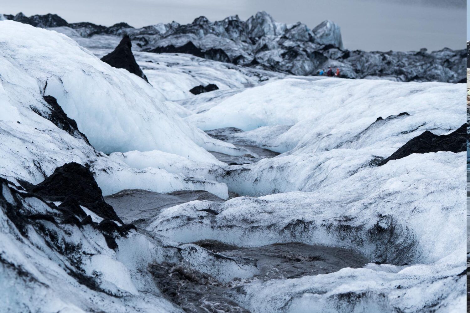 People in a crevasse for a cool photo on the glacier
