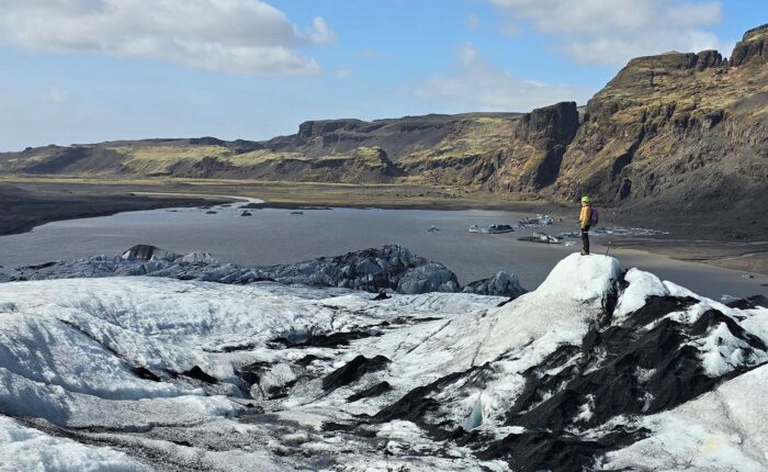 Person looking small in the vastness of nature