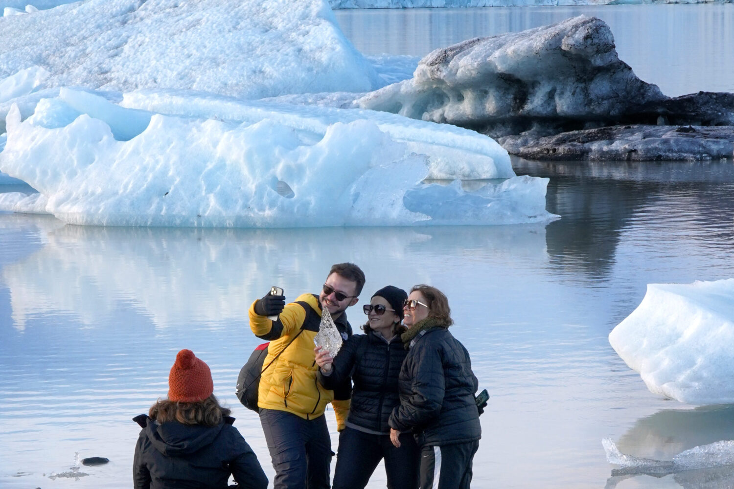 People taking selfie by the Glacier Lagoon.